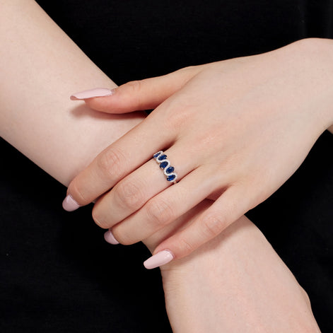 925 silver ring with oval blue zirconia stones and sparkling accents