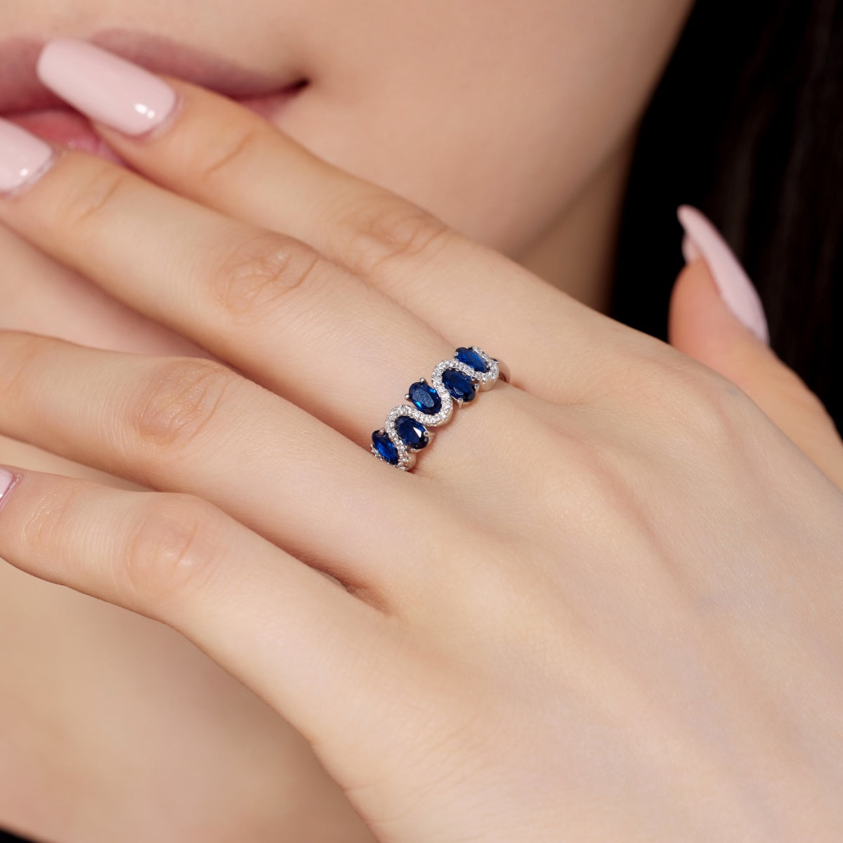 925 silver ring with oval blue zirconia stones and sparkling accents