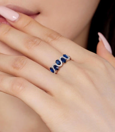 925 silver ring with oval blue zirconia stones and sparkling accents