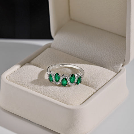 925 silver ring with oval green zirconia stones and sparkling accents