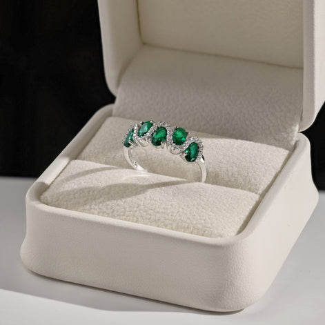 925 silver ring with oval green zirconia stones and sparkling accents