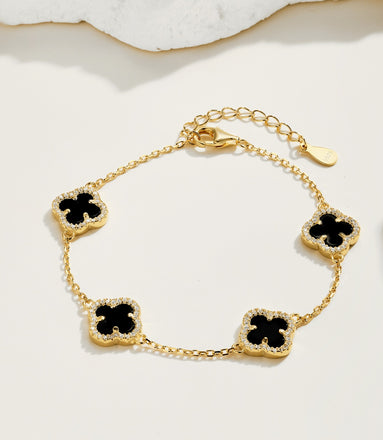Gold-plated bracelet made of 925 silver – with black clover leaf pendants & zirconia