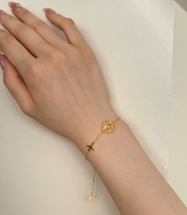 Bracelet with globe and airplane – sterling silver gold-plated