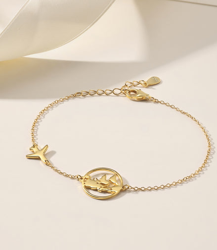 Bracelet with globe and airplane – sterling silver gold-plated