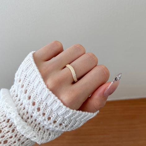 925 silver ring 18K gold plated with small zirconia stones in curved shape