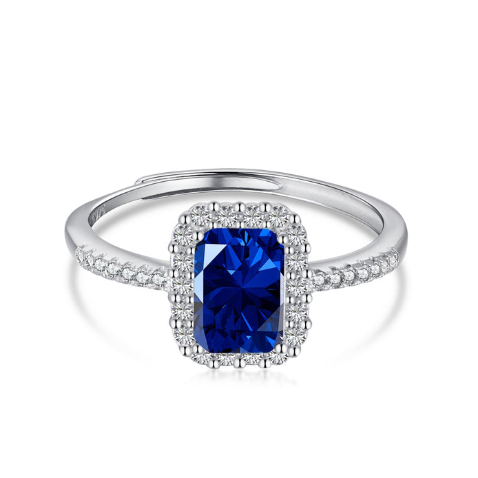 Elegant 925 silver ring with dark blue zirconia and sparkling accents