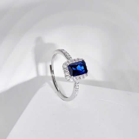 Elegant 925 silver ring with dark blue zirconia and sparkling accents