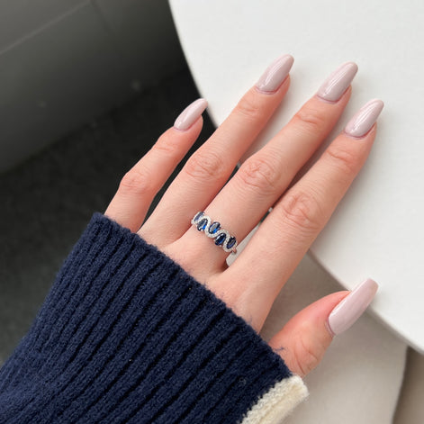 925 silver ring with oval blue zirconia stones and sparkling accents