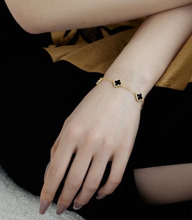 Gold-plated bracelet made of 925 silver – with black clover leaf pendants & zirconia