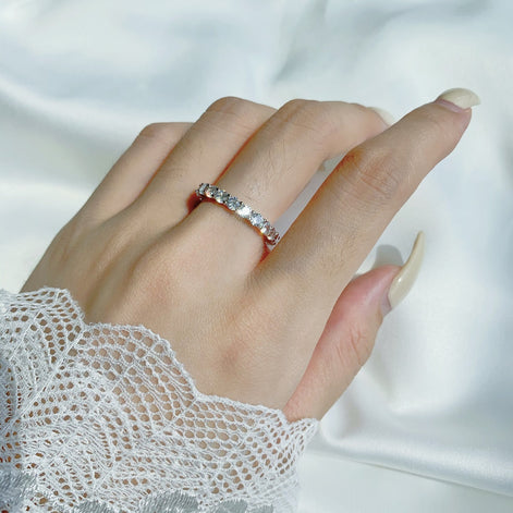 Sterling silver ring set with fine zirconia stones all around