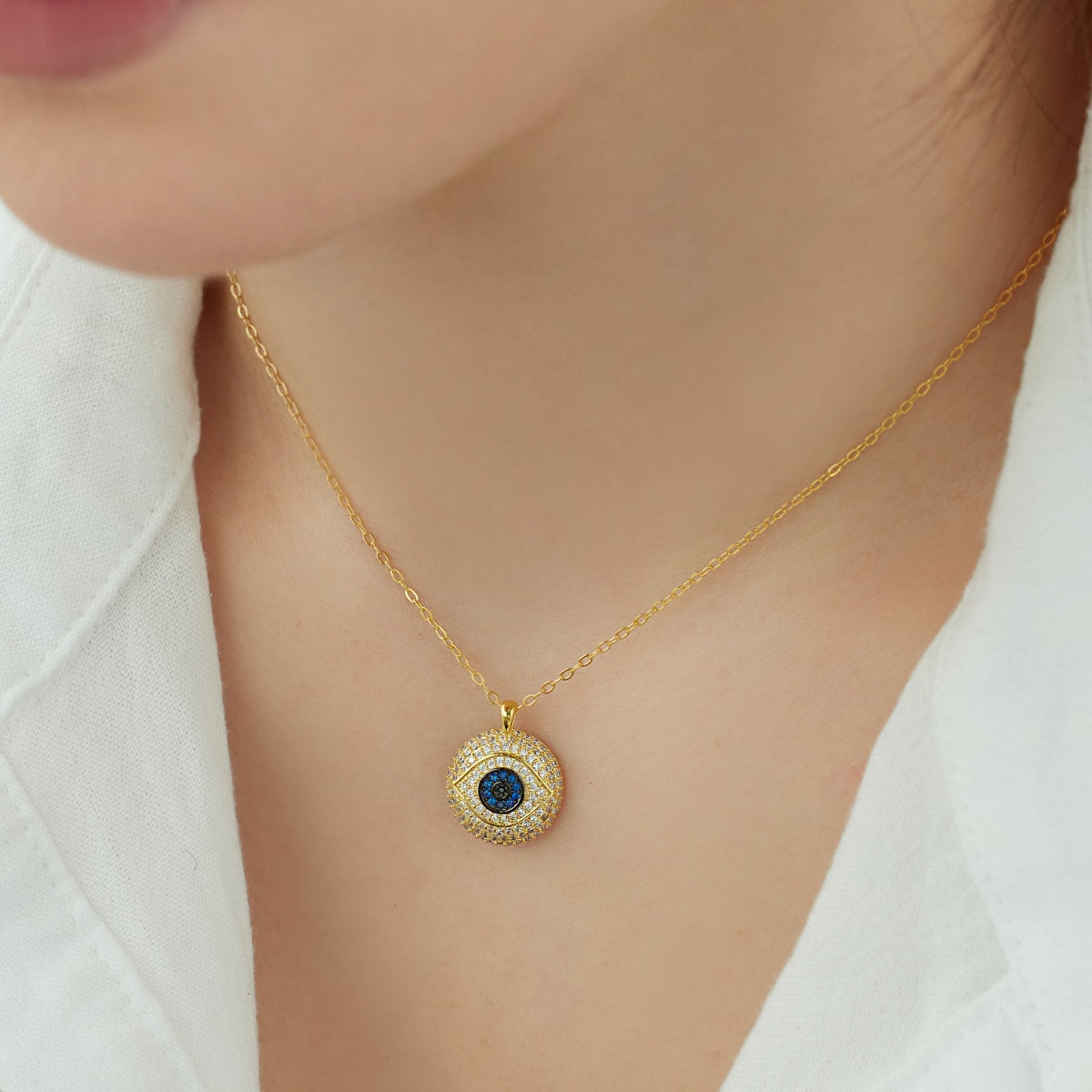 Necklace with eye pendant – 18K gold-plated & set with zirconia