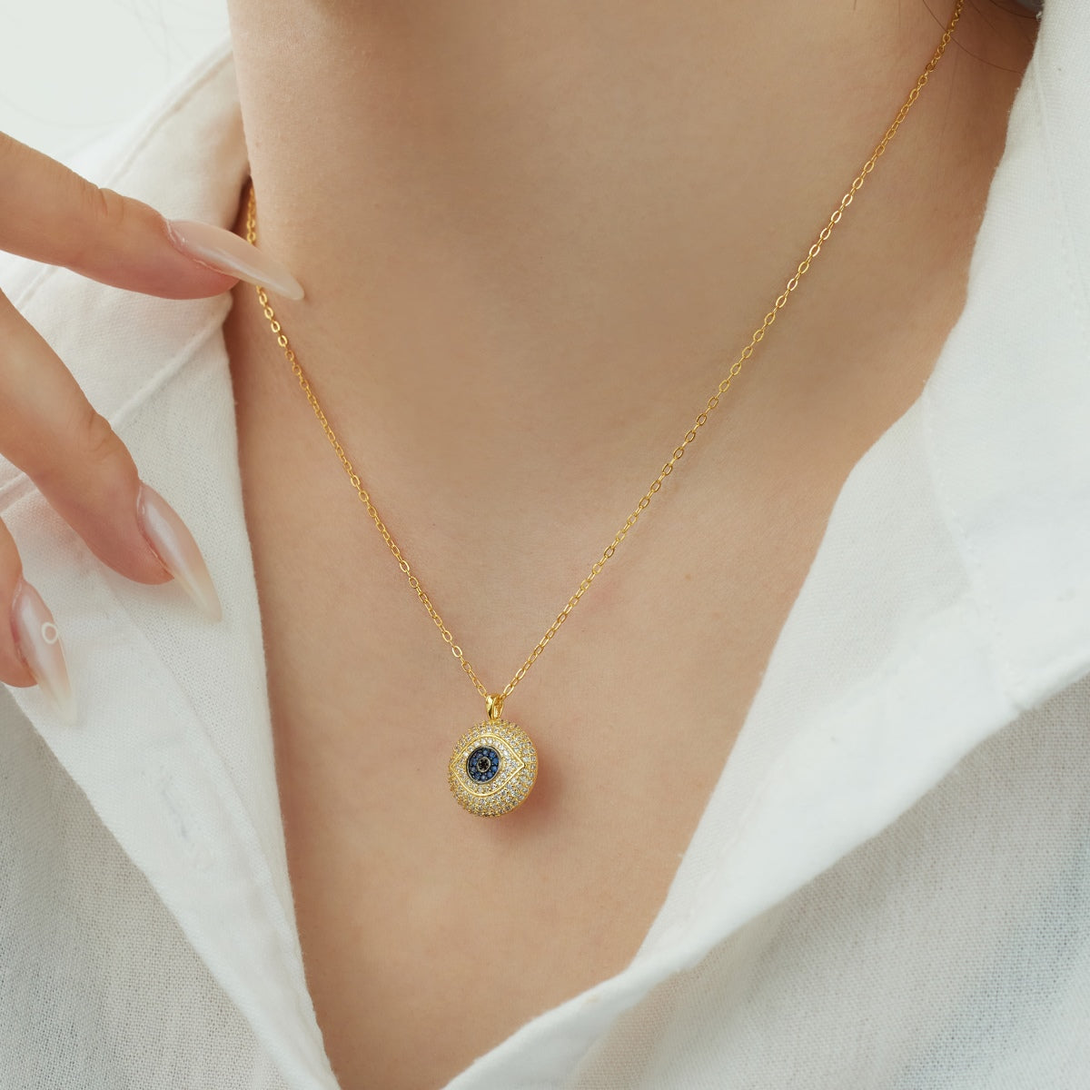 Necklace with eye pendant – 18K gold-plated & set with zirconia