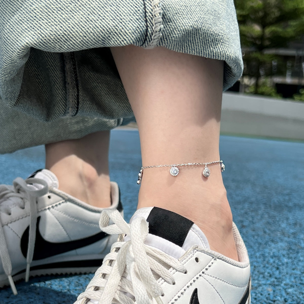 Anklet made of 925 silver with zirconia and infinity pendants