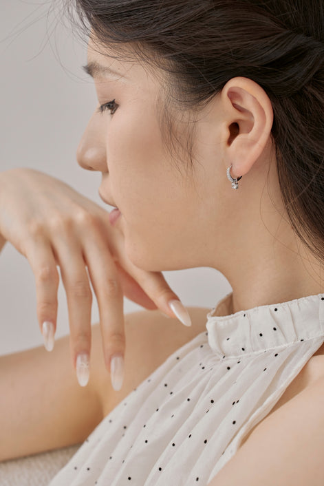 Hoop earrings made of 925 sterling silver with zirconia stones