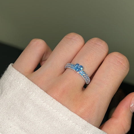 925 silver ring with heart zirconia in light blue and sparkling zirconia edge