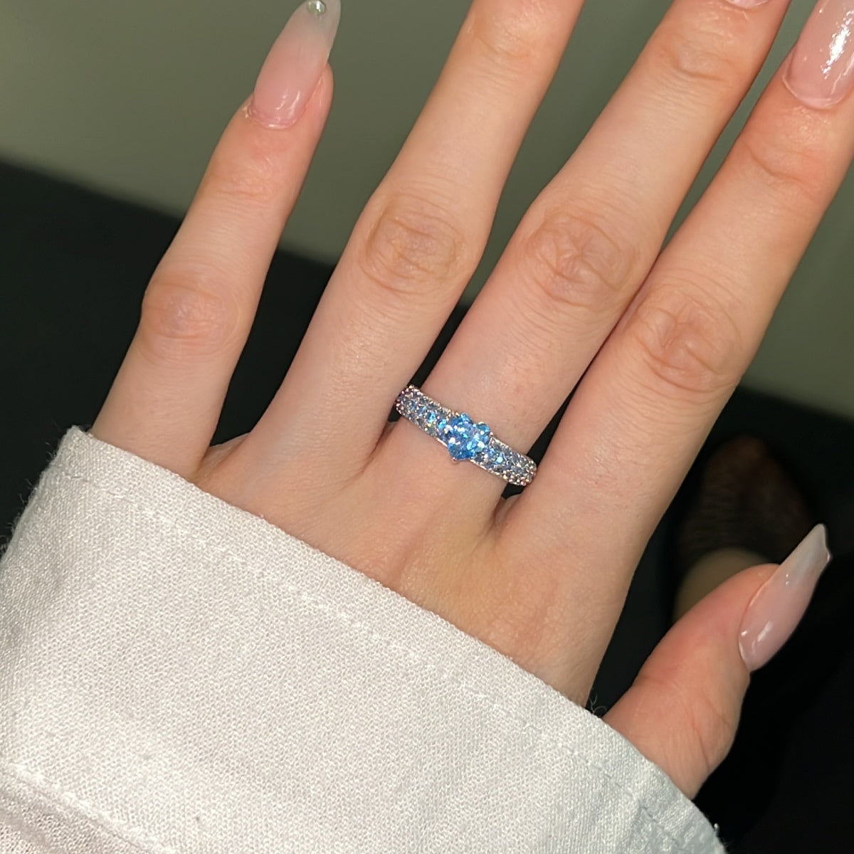 925 silver ring with heart zirconia in light blue and sparkling zirconia edge