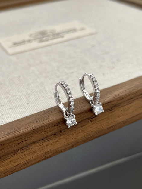 Hoop earrings made of 925 sterling silver with zirconia stones