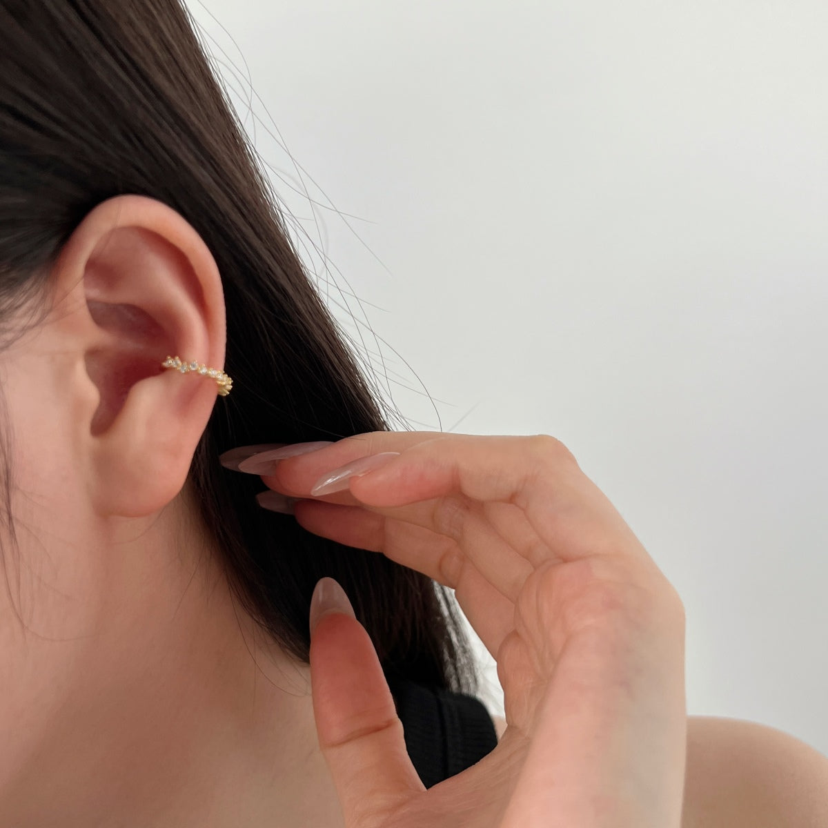 Ear clip made of 925 silver gold-plated with zirconia stones