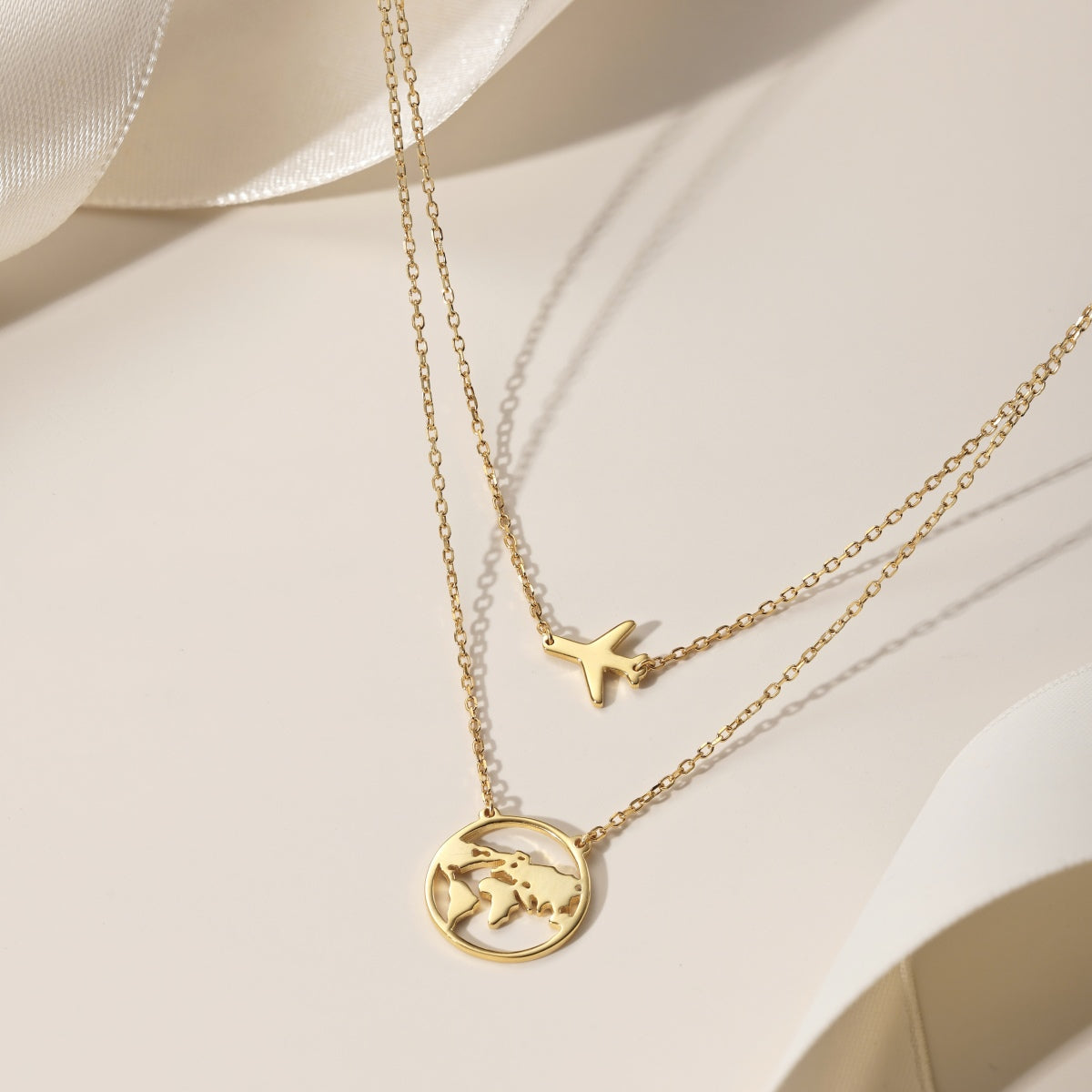 Double chain – 18K gold-plated 925 sterling silver with earth & airplane pendant