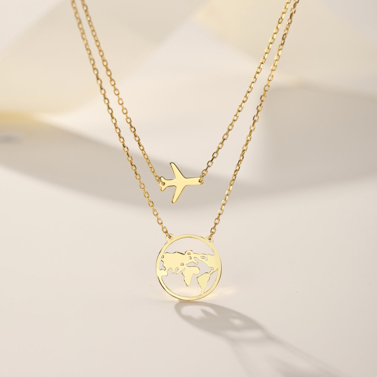 Double chain – 18K gold-plated 925 sterling silver with earth & airplane pendant