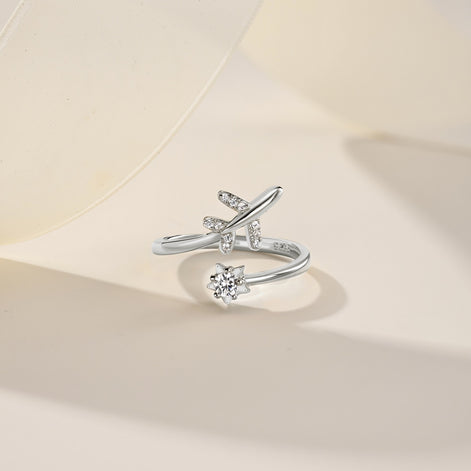 Adjustable 925 silver ring in open design with airplane and star motif
