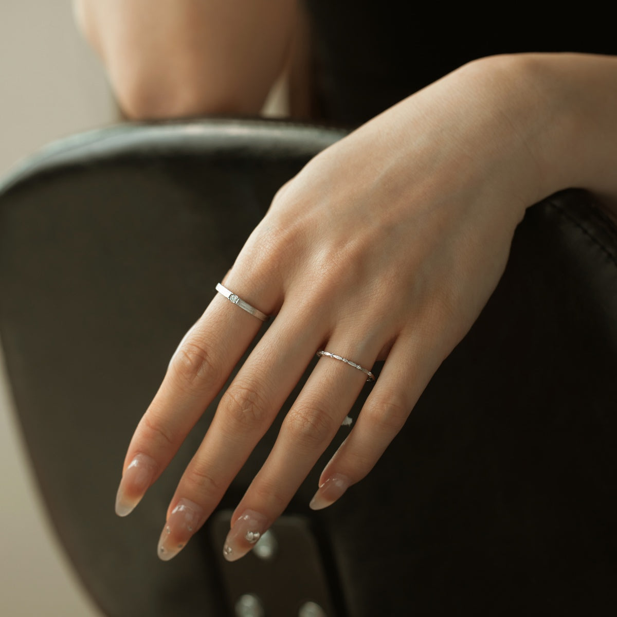 Fine 925 Sterling silver ring with zirconia stones and modern pattern