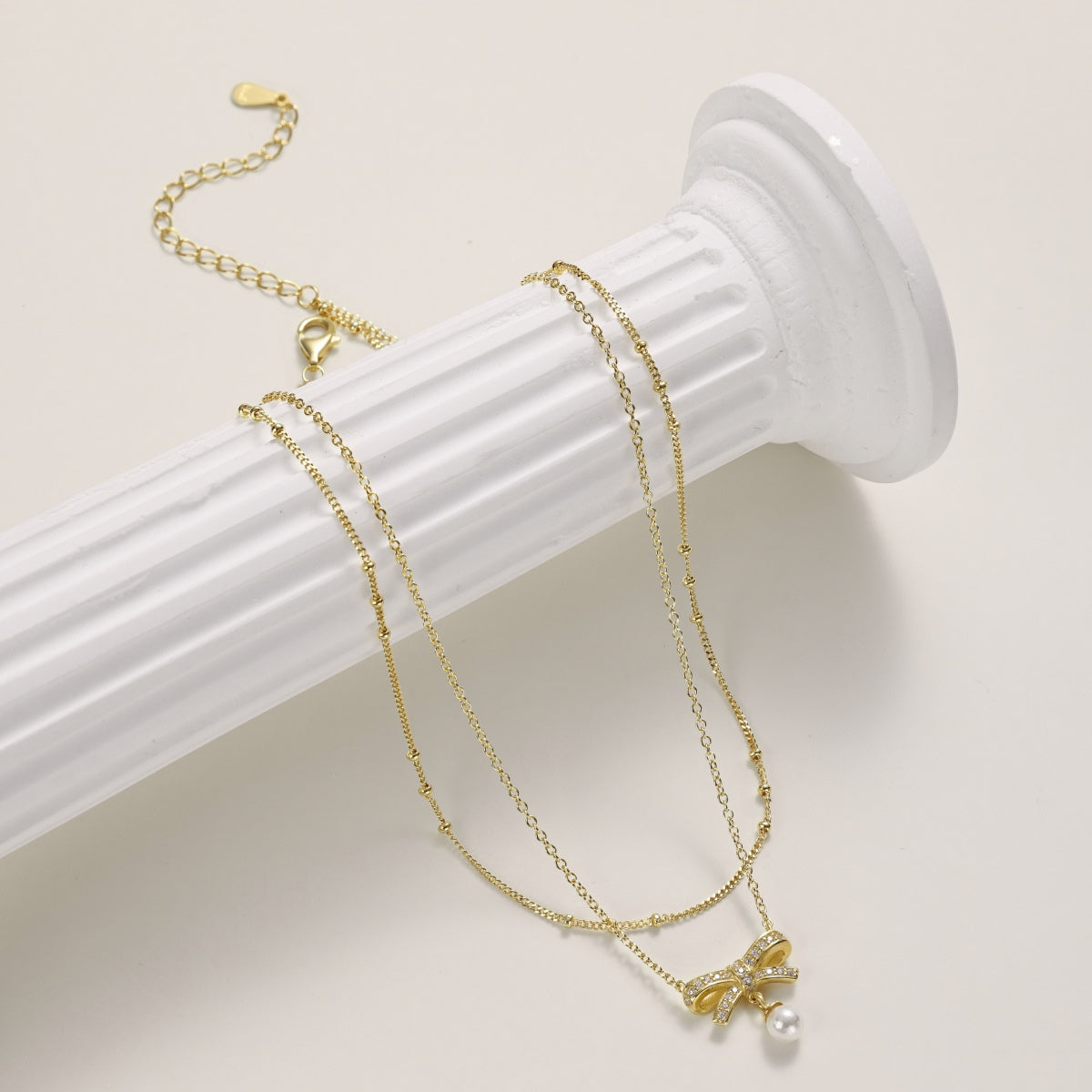18K gold-plated double chain made of 925 sterling silver with bow pendant & pearl