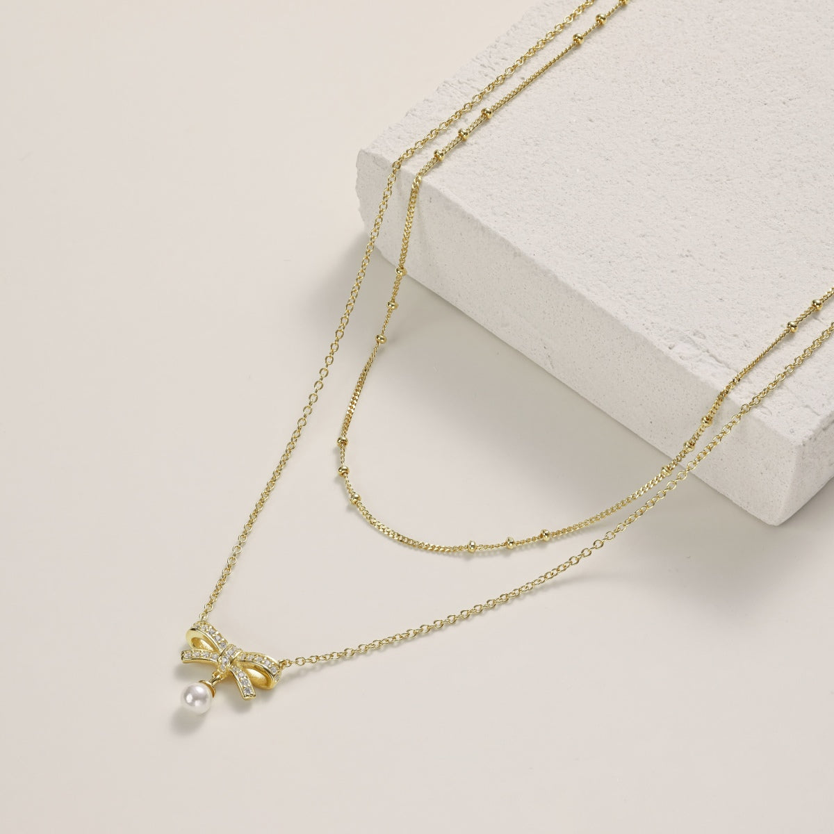 18K gold-plated double chain made of 925 sterling silver with bow pendant & pearl