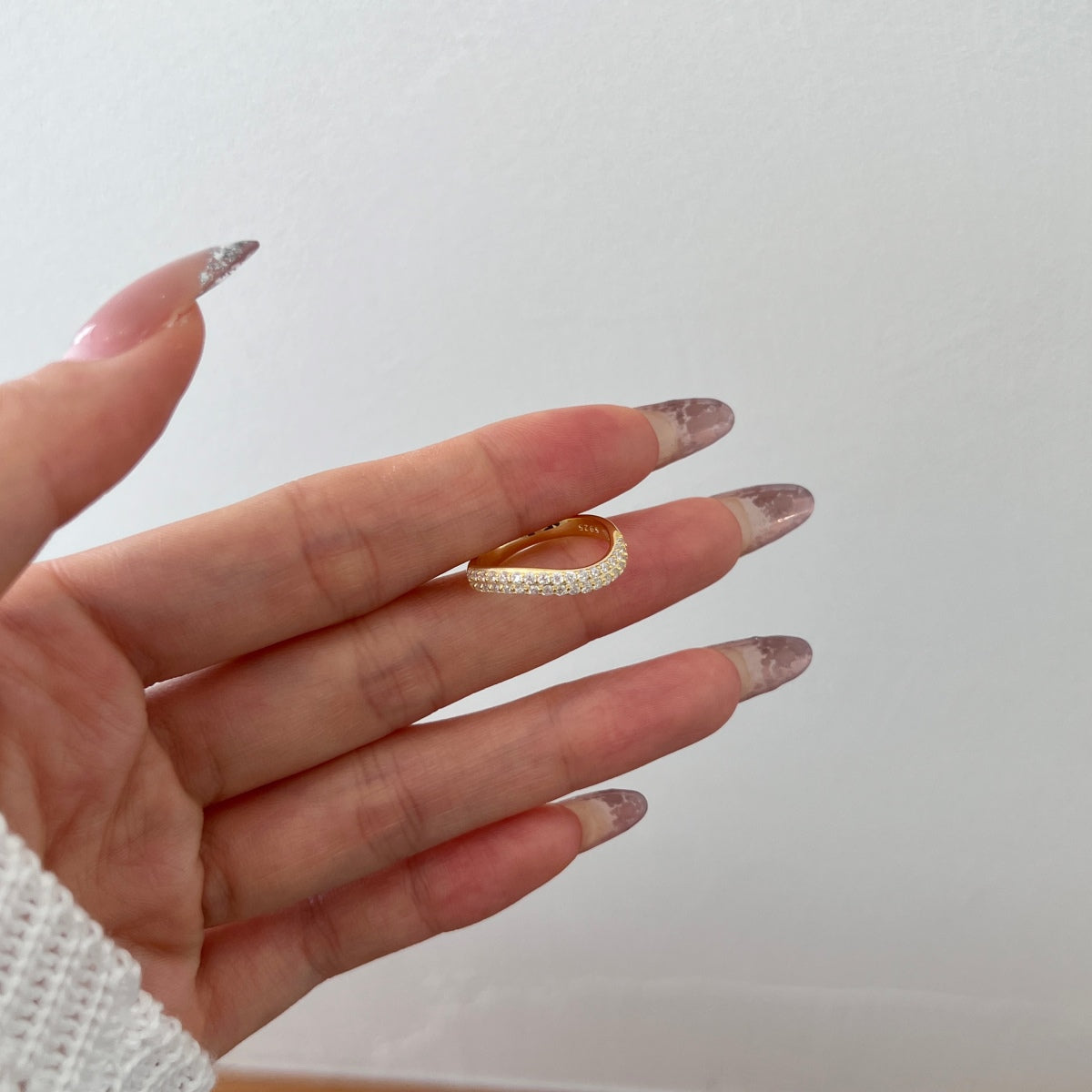 925 silver ring 18K gold plated with small zirconia stones in curved shape