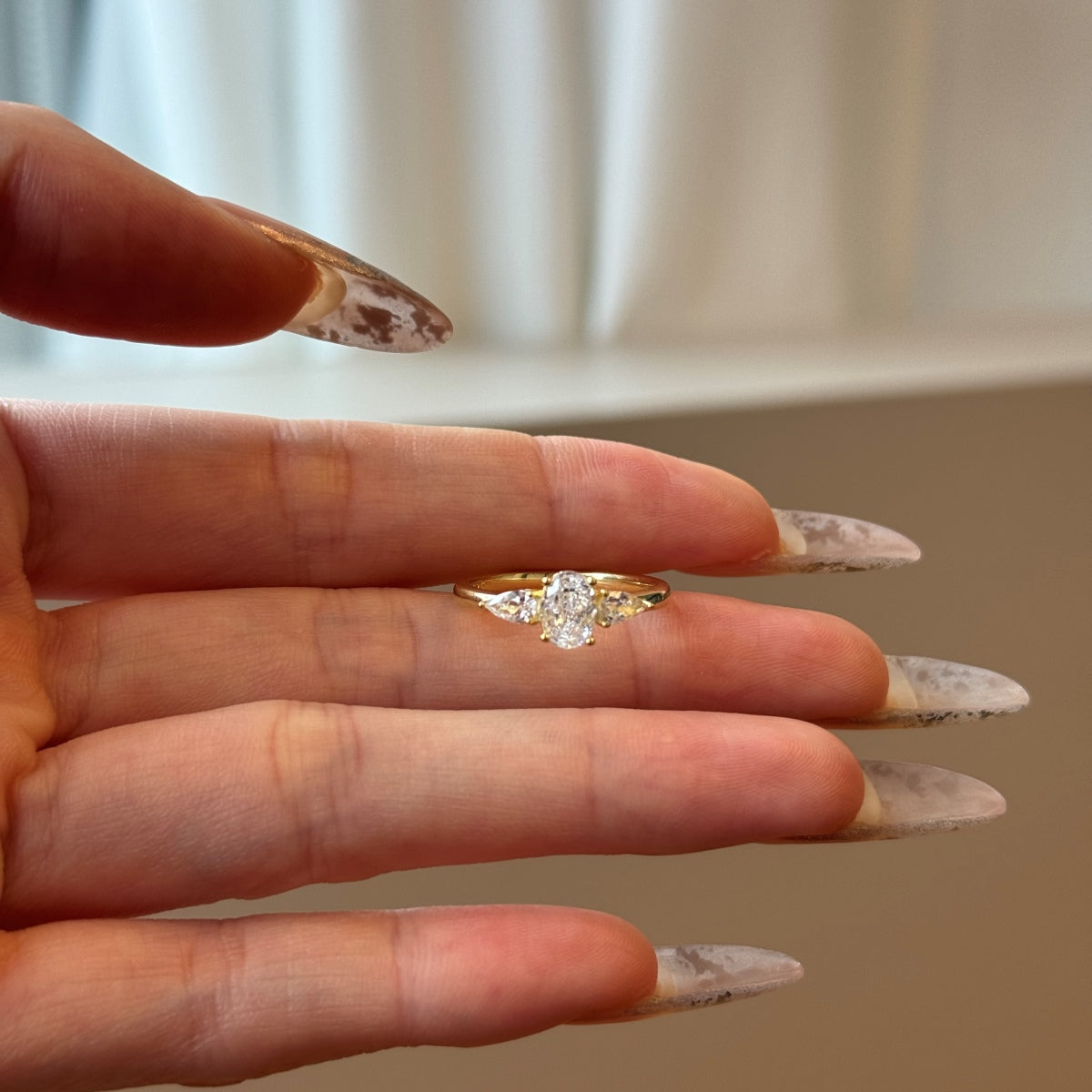 14K gold-plated 925 silver ring with oval zirconia and sparkling accents