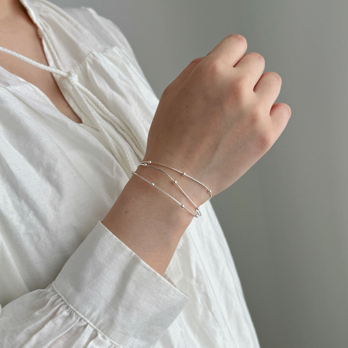Multi-row bracelet made of 925 silver with ball details