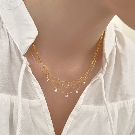 Multi-row chain made of 925 sterling silver – 18K gold-plated with zirconia pendants