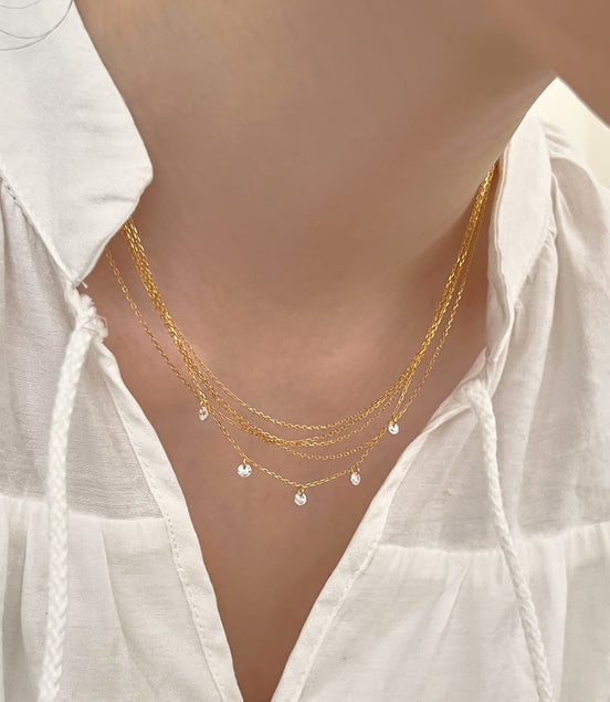 Multi-row chain made of 925 sterling silver – 18K gold-plated with zirconia pendants