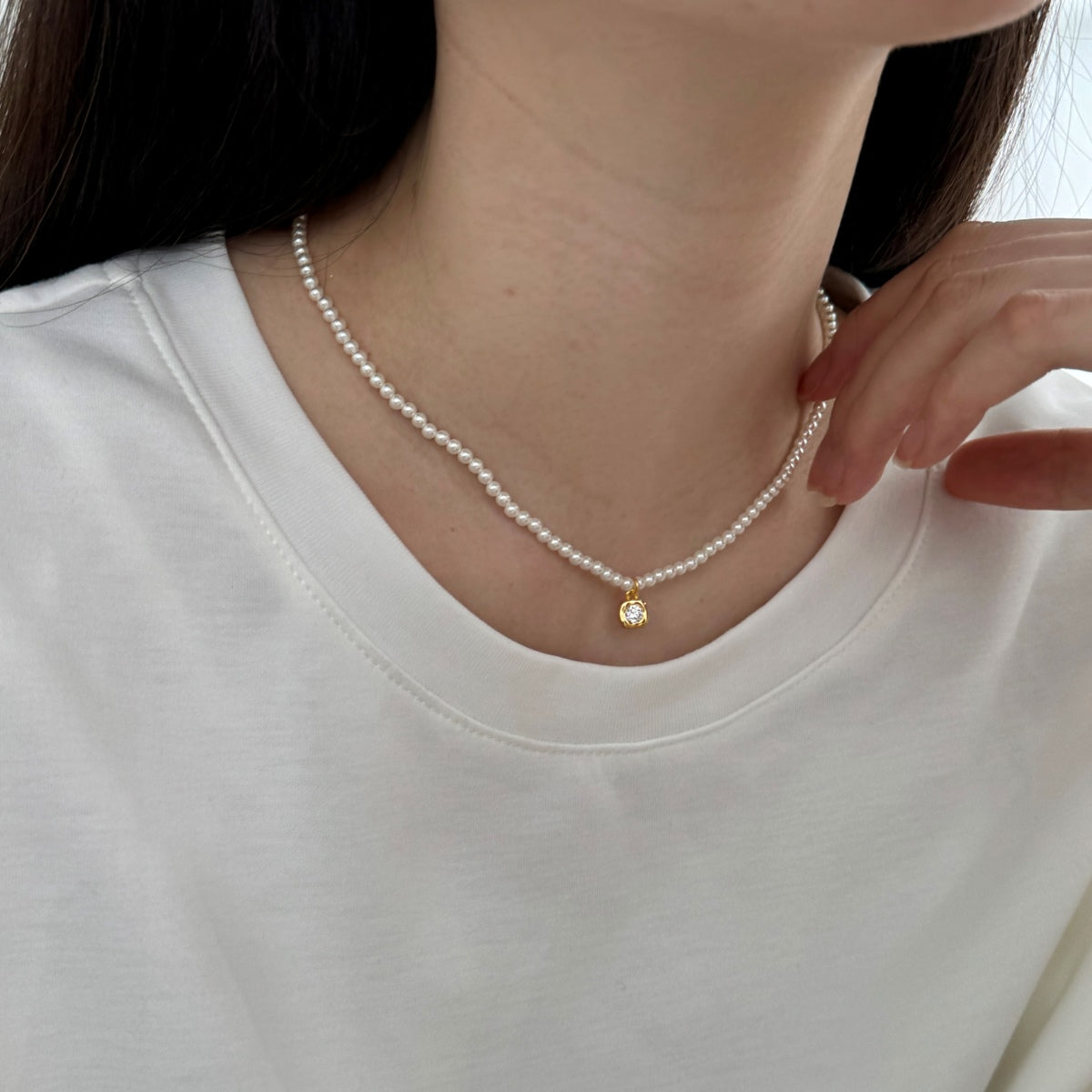 Pearl necklace with 18K gold-plated pendant