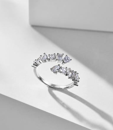 Adjustable 925 silver ring with 12 zirconia stones in unique shapes