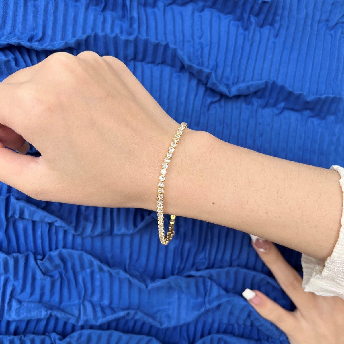 Bracelet made of 925 sterling silver with zirconia stones set all around, 18K gold-plated