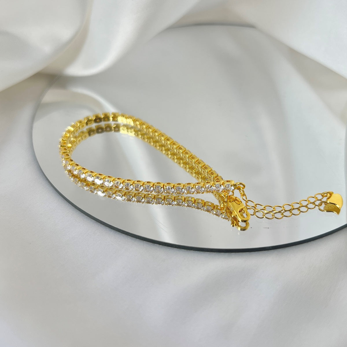 Bracelet made of 925 sterling silver with zirconia stones set all around, 18K gold-plated