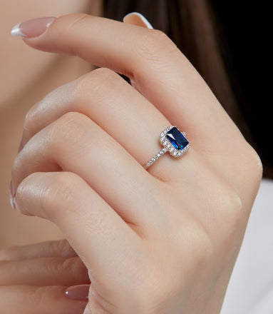 Elegant 925 silver ring with dark blue zirconia and sparkling accents