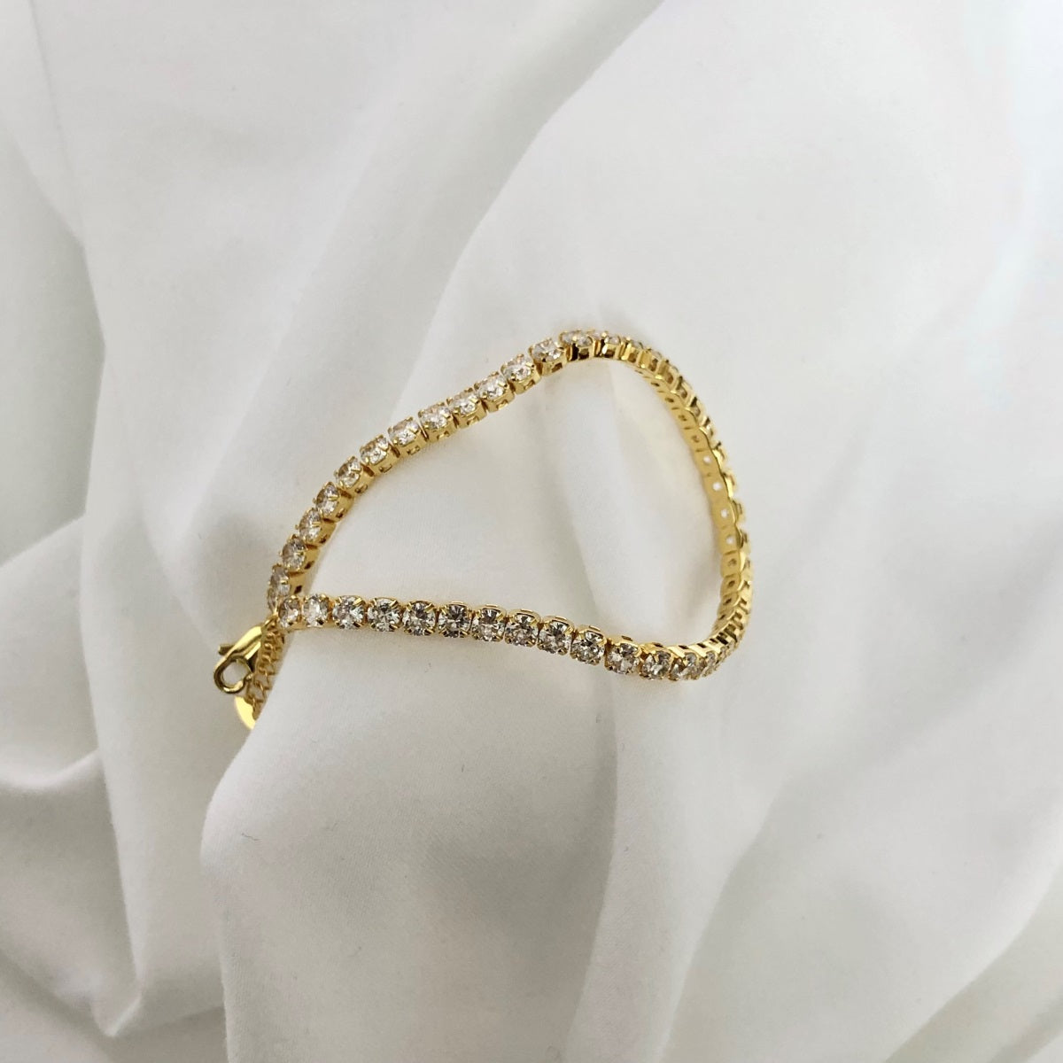 Bracelet made of 925 sterling silver with zirconia stones set all around, 18K gold-plated