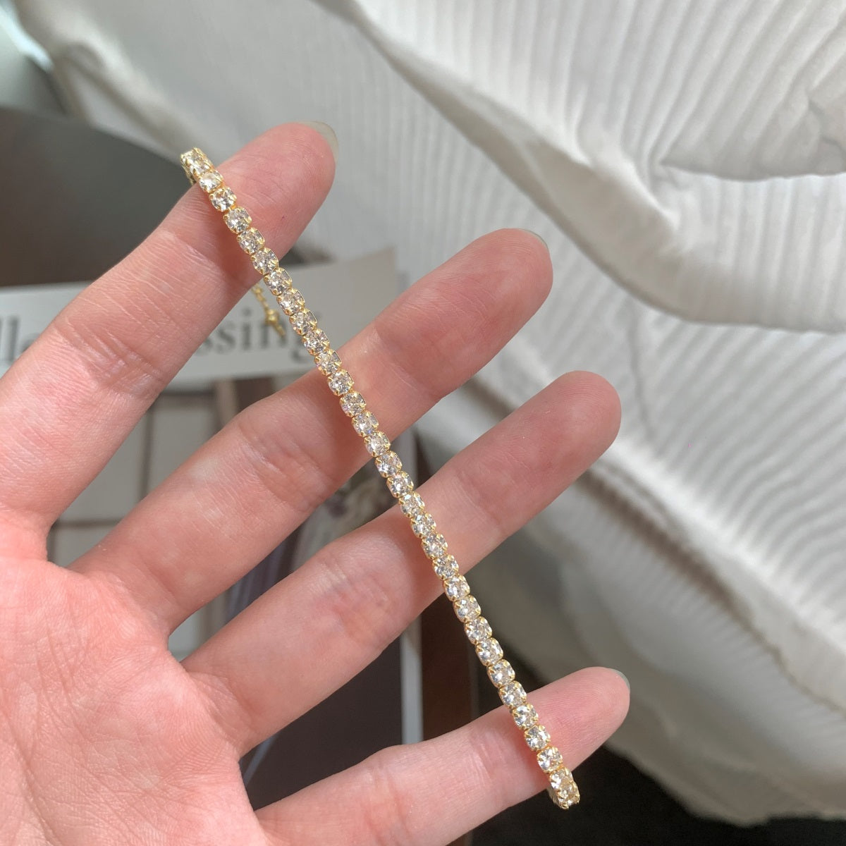 Bracelet made of 925 sterling silver with zirconia stones set all around, 18K gold-plated