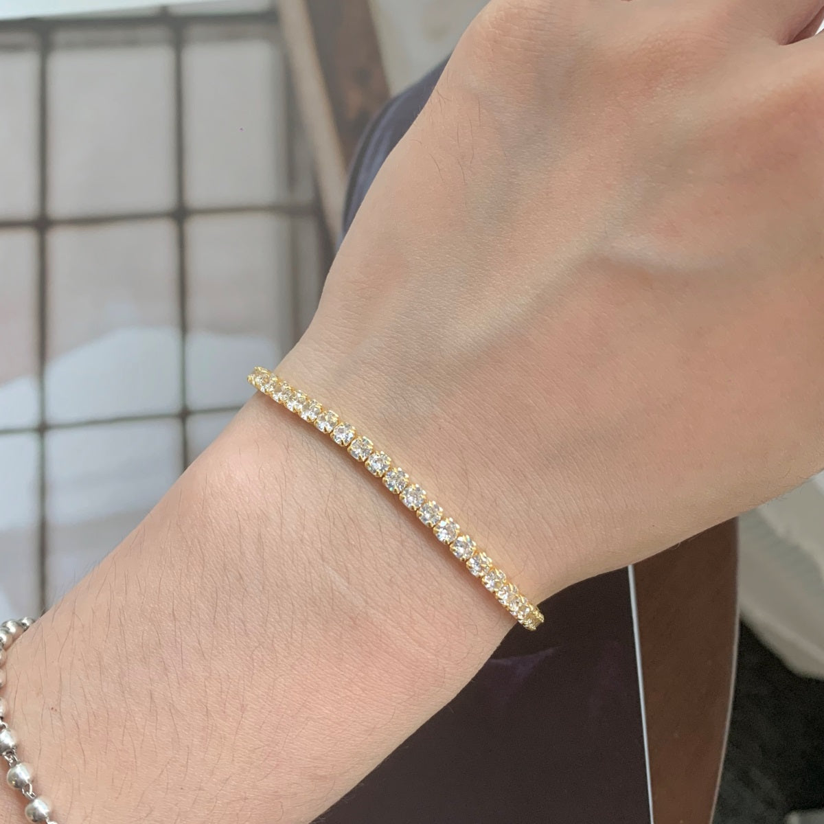 Bracelet made of 925 sterling silver with zirconia stones set all around, 18K gold-plated