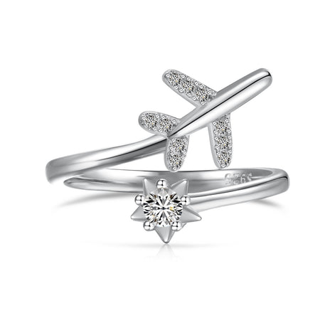 Adjustable 925 silver ring in open design with airplane and star motif