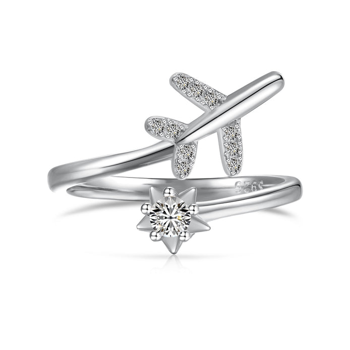 Adjustable 925 silver ring in open design with airplane and star motif