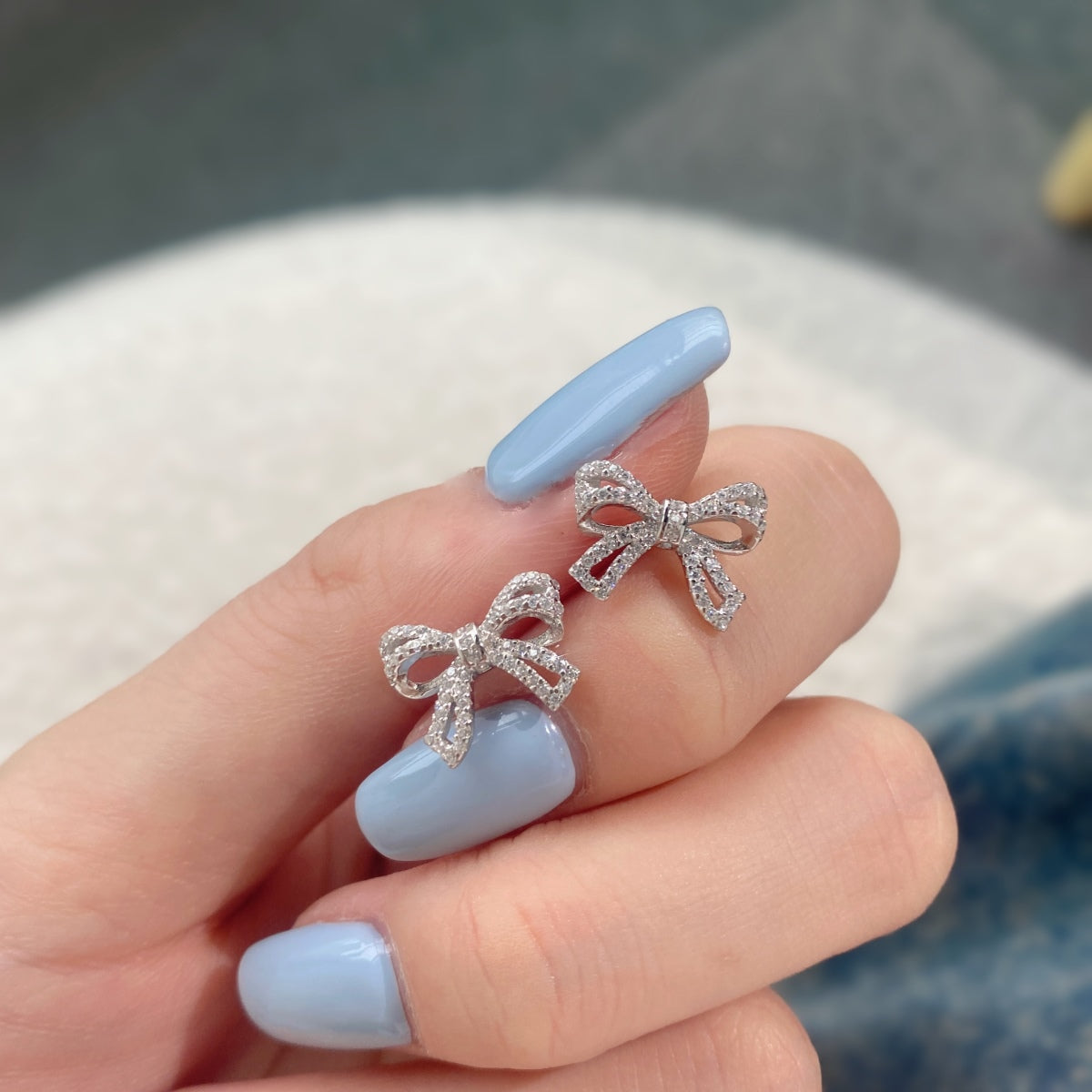 Bow earrings made of 925 silver with zirconia