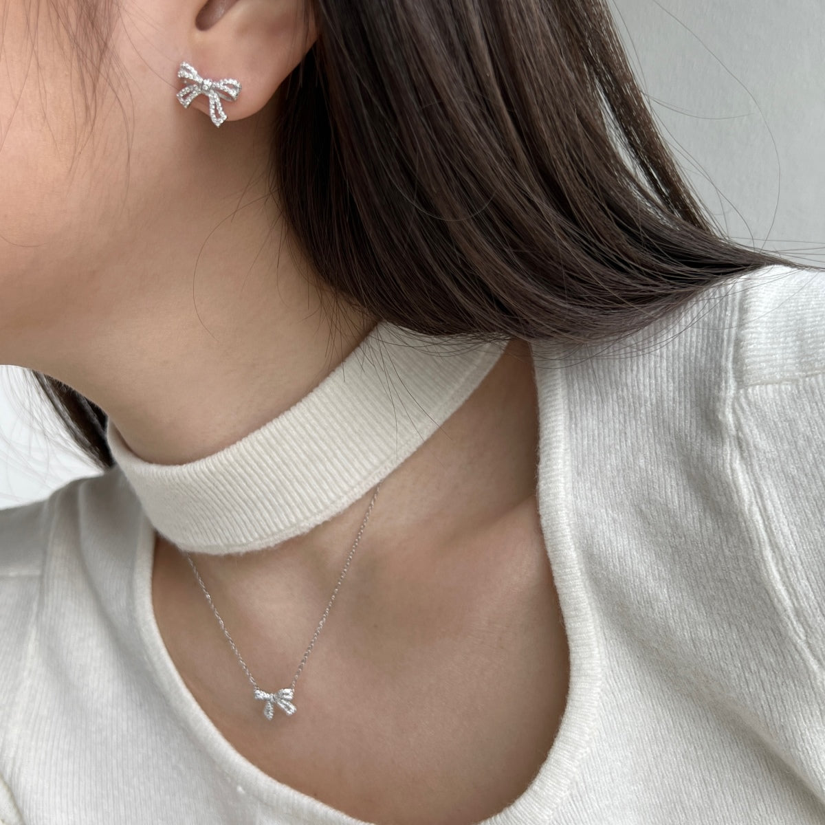 Bow earrings made of 925 silver with zirconia