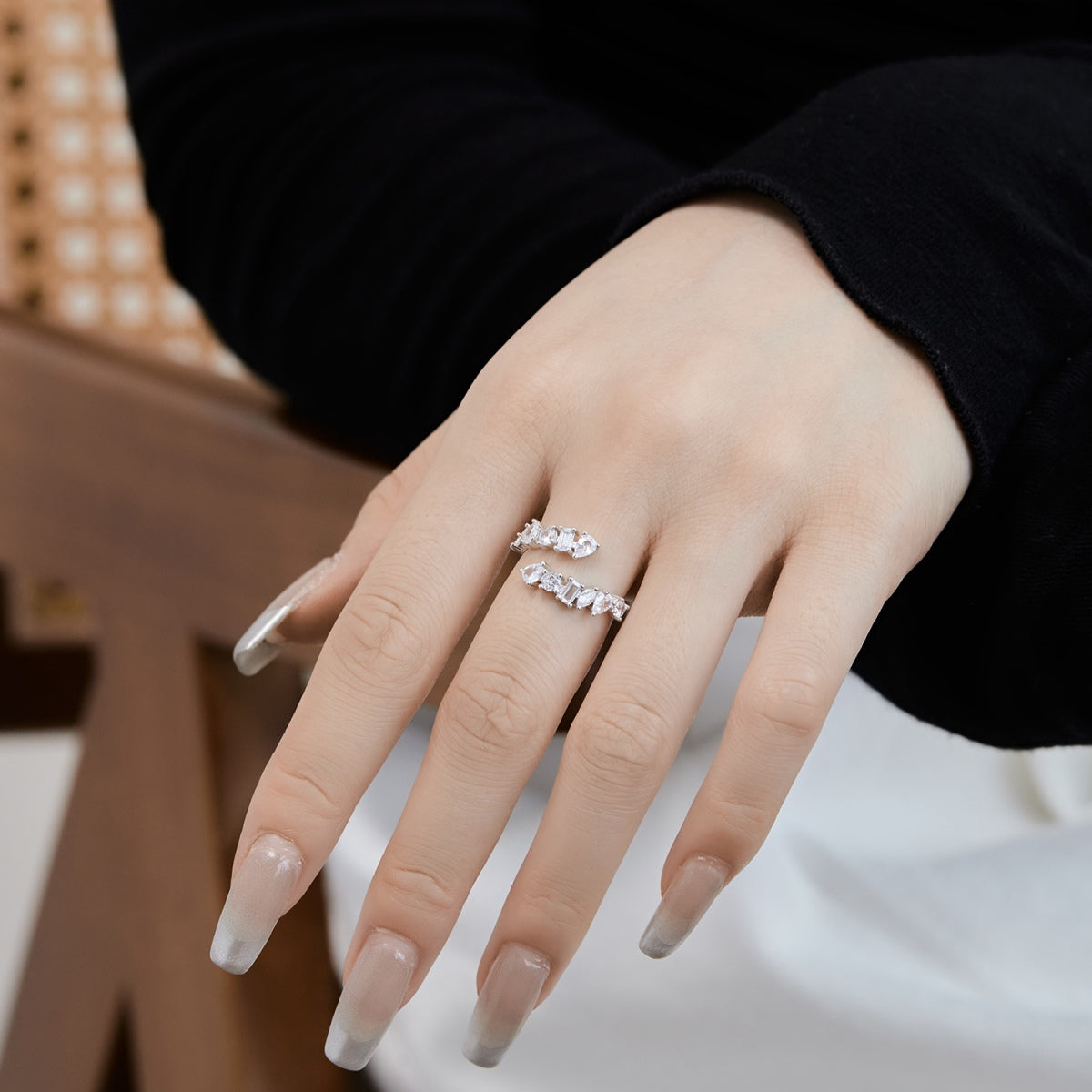 Adjustable 925 silver ring with 12 zirconia stones in unique shapes