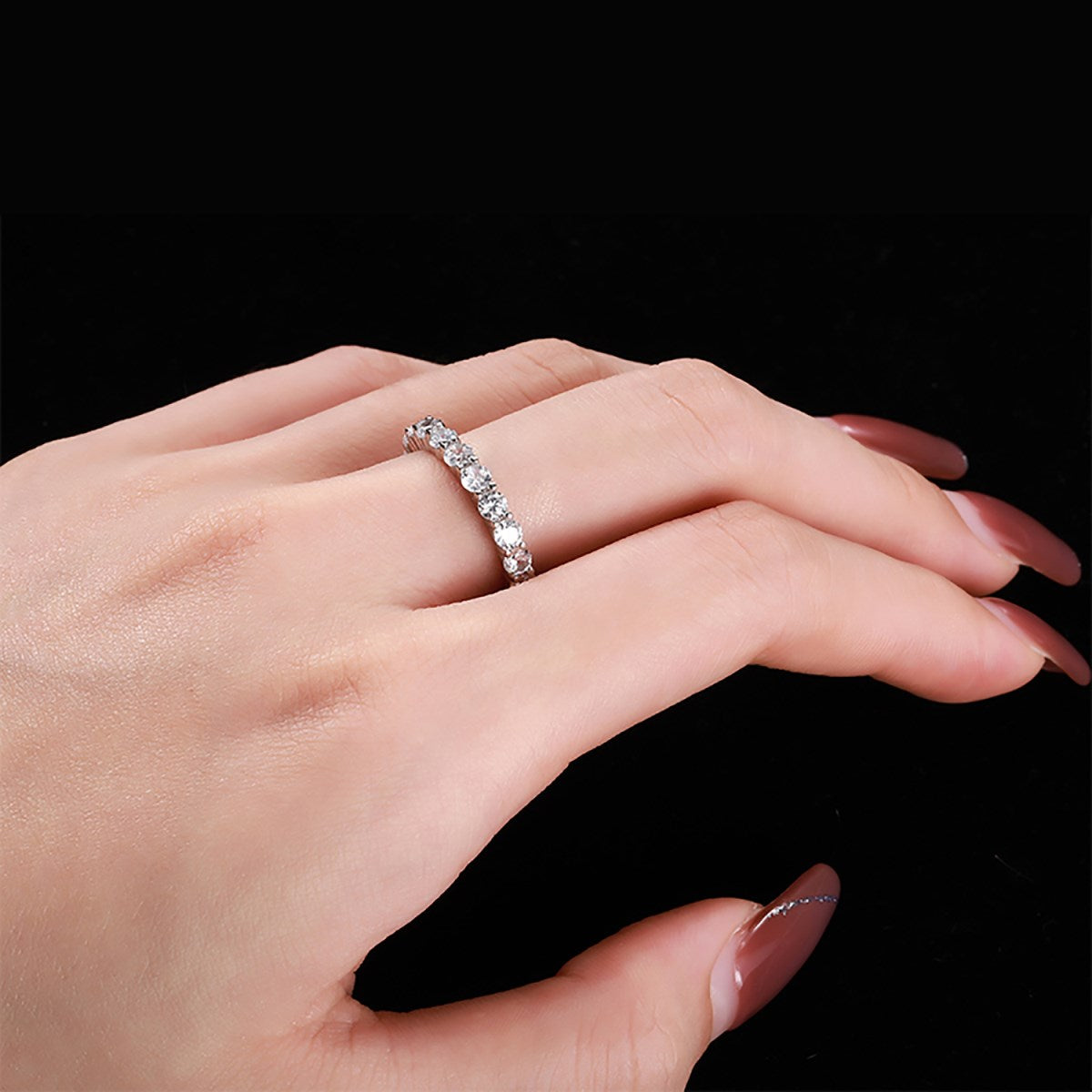 Sterling silver ring set with fine zirconia stones all around
